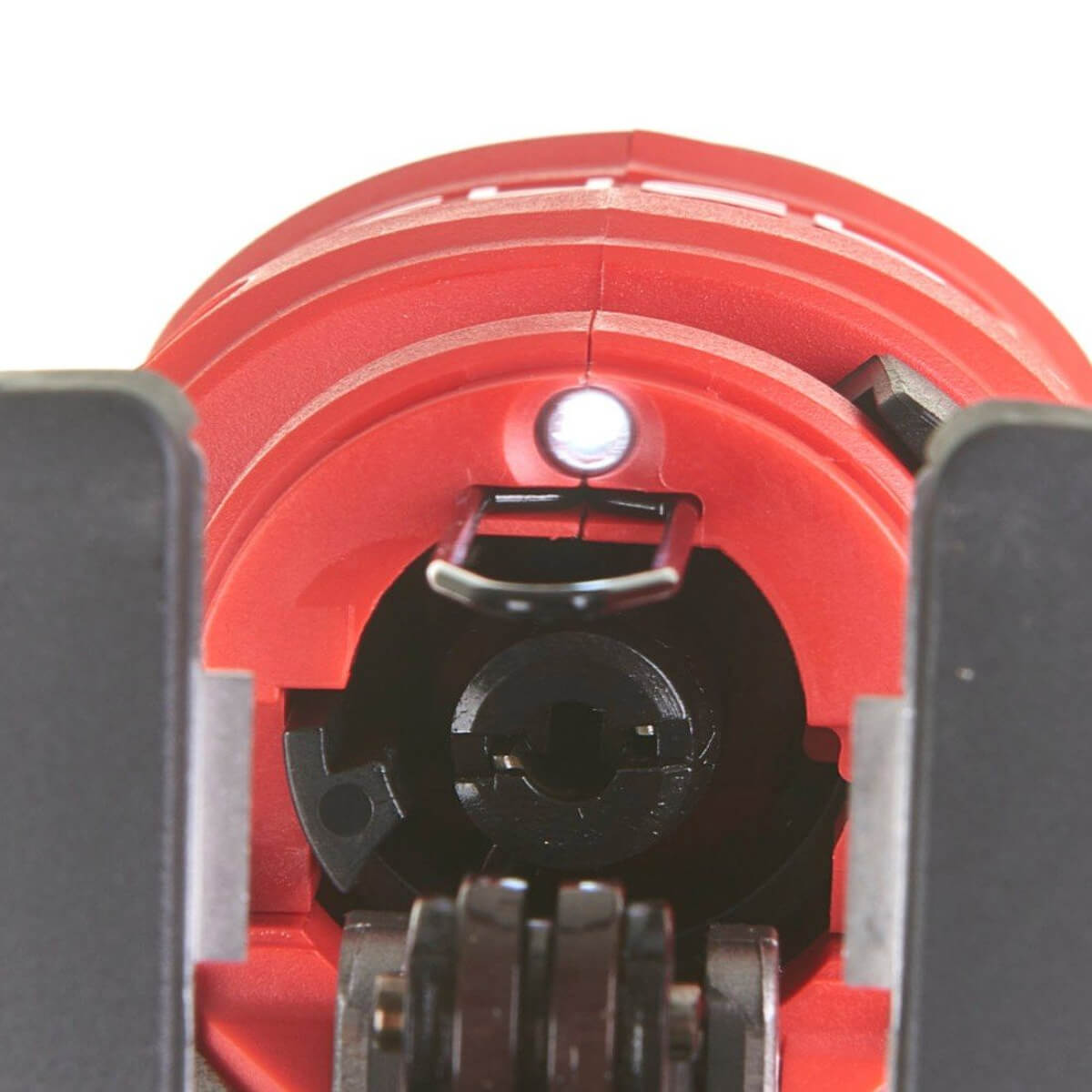 Close-up of a red and black Jigsaw, presenting the task lighting when in use