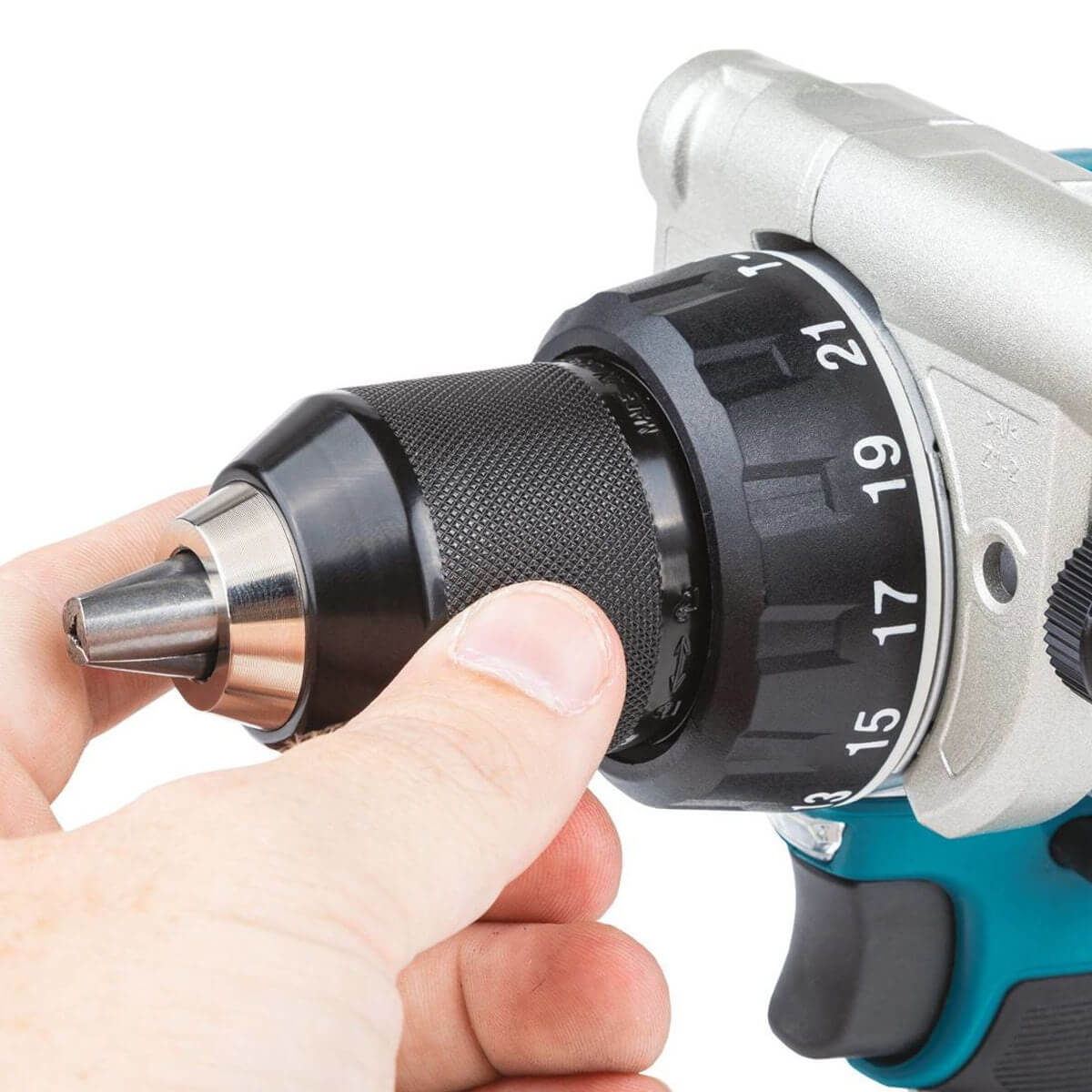 Close-up of the Makita DHP486Z drill, hand adjusting the metal chuck visible