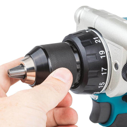 Close-up of the Makita DHP486Z drill, hand adjusting the metal chuck visible