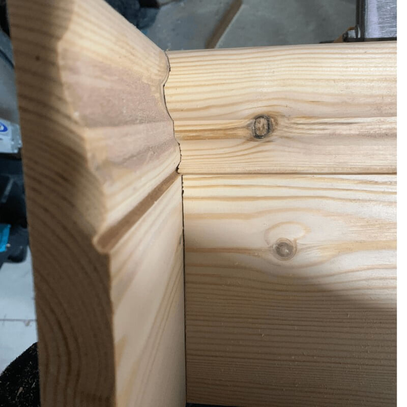 An  example of what a scribe cut out  of a length of skirting board will look like