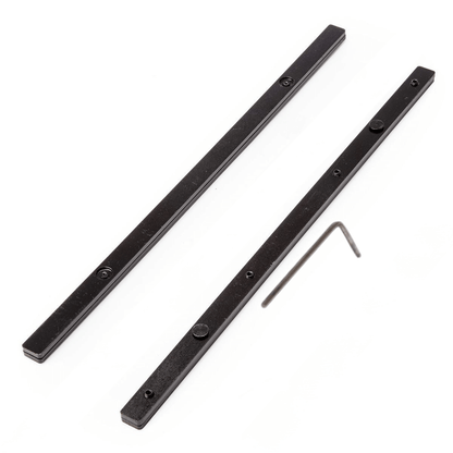 Two black metal rail connectors with a small hex key on a white background
